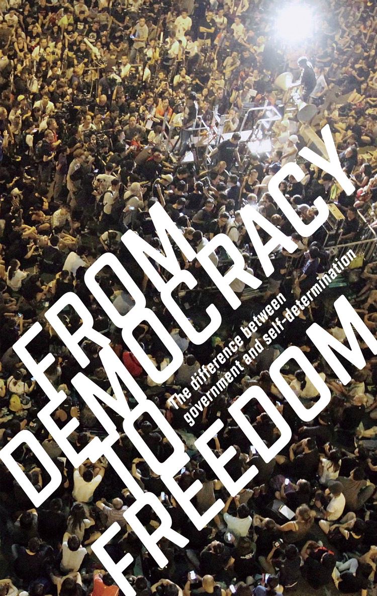 Cover of the book From Democracy to Freedom depicting what appears to be a large group of protesters gathered in a public space